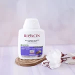 شامپو ضد ریزش بیوکسین حاوی عصاره سیر سیاه